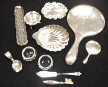 A box of assorted silver wares to include a silver backed hand mirror, a silver scallop shaped dish,