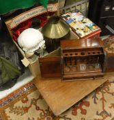 A mahogany medical instrument cabinet by Arnold & Sons of London, a brass student's lamp,