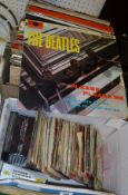 A collection of records to include The Beatles "Please Please Me", "Beatles for Sale",