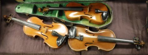 Three various violins, one with label "The Maidstone" by Murdoch, Murdoch and Co.