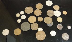A collection of coins to include a Victorian 1858 penny,