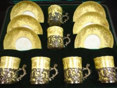 A cased set of six silver mounted Staffordshire coffee cans and saucers,