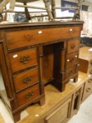 A mahogany knee hole desk in the 18th Century manner,