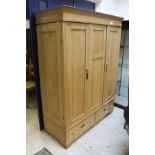 A reclaimed pine double wardrobe with two drawers