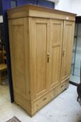 A reclaimed pine double wardrobe with two drawers