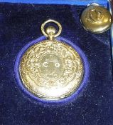 An 18 carat gold cased pocket watch, the case set with scrolling foliate decoration and anchor,