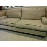 A pair of modern sofas, one three seat,