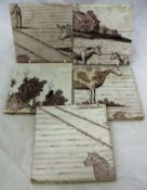 A collection of puce Delft ware tiles depicting a country/farming scene