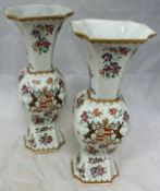 A pair of Samson of Paris Gu shaped vases decorated with armorial of eagle top helmet and shield