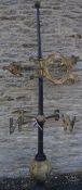 A Victorian cast iron and gold painted Gothic style weather vane of large proportions