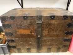 A late Victorian studded iron bound oak silver chest with heavy side carrying handles