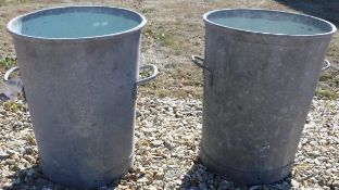 Two galvanised bins with painted interiors