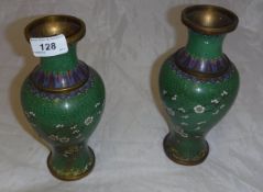 A pair of modern Chinese cloisonné green ground baluster shaped vases with prunus blossom