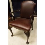 A pair of mahogany elbow chairs in the George III taste,