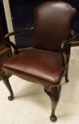 A pair of mahogany elbow chairs in the George III taste,