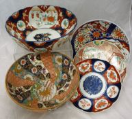 Assorted Imari wares to include a punch bowl decorated with coi carp,