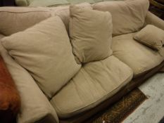 A modern mushroom upholstered sofa,
