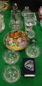 A collection of glass ware to include paperweights, candle holders,