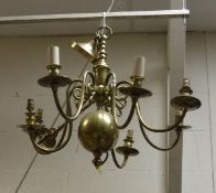 A brass eight branch electrolier in the 18th Century Dutch manner