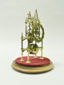A Victorian brass skeleton clock with single fusée movement and Roman numerals to the dial,