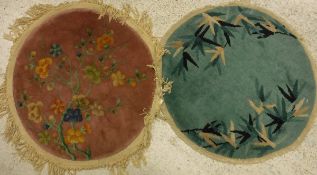 A pair of Chinese 1920's circular rugs, one of green colour with grass style design,