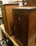 A collection of furniture comprising eight wheel back kitchen chairs, two Victorian pot cupboards,
