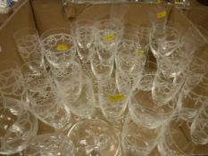 Three boxes of glassware to include cut glass decanters and a large selection of acid etched wine