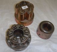 Three Victorian copper jelly moulds, one with chain link motif to top, marked "M443",