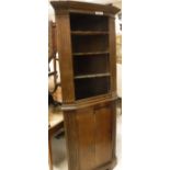 A 19th Century oak corner cupboard,