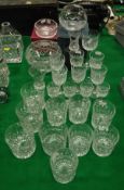 A collection of cut glass tumblers and sherry and port glasses,