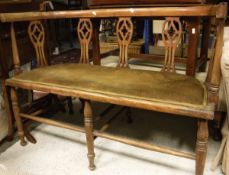 An Edwardian mahogany and satinwood strung three piece salon suite,