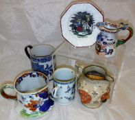 Two Chinese blue and white decorated mugs, a Mason's ironstone mug,