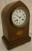 A JW Benson mahogany mantle clock with Roman numerals, the dial marked "J.W.