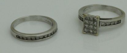 An 18 carat white gold and chip diamond wedding ring set