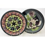 Two modern Moorcroft plates CONDITION REPORTS Crazing to both plates,