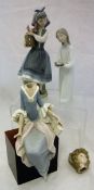 A collection of three Lladro figurines to include "Dutch girl with barrel of flowers" (3)