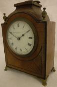 A 19th Century mahogany cased mantle clock, retailed by Manoah Rhodes & Sons Ltd of Bradford,