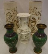 A pair of modern Chinese cloisonné green ground baluster shaped vases with prunus blossom