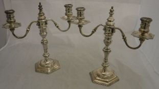 A pair of silver twin branch candelabra,