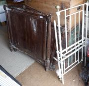 A French folding wrough iron bedstead painted green, a French walnut single bedstead,