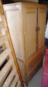 A pine kitchen cupboard,