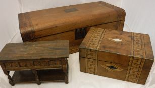 A walnut and parquetry inlaid dome topped writing slope, a mahogany tea caddy with squat bun feet,