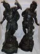 A pair of 19th Century Spelter figures as warriors raised upon a stepped ogee bracket on plinth