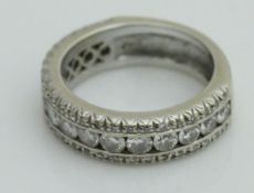 An 18 carat white gold three rose diamond Favero ring,