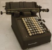 A Burroughs adding machine