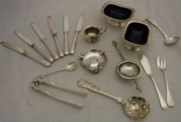 A small collection of various silver plated items to include sifter spoon, tea strainer,