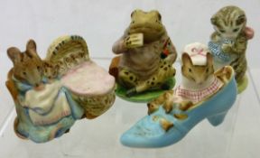 A collection of four Beswick Beatrix Potter figurines including "Mr Jeremy Fisher" (gold back