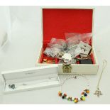 One box of assorted costume jewellery to include bangles, brooches,
