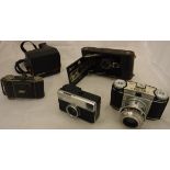 A box of assorted vintage cameras to include examples by Kodak and Paxina,
