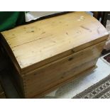A pine domed top Captain's type trunk
